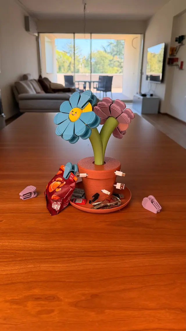 The Bloom Stack vase with its flowers on a living room table