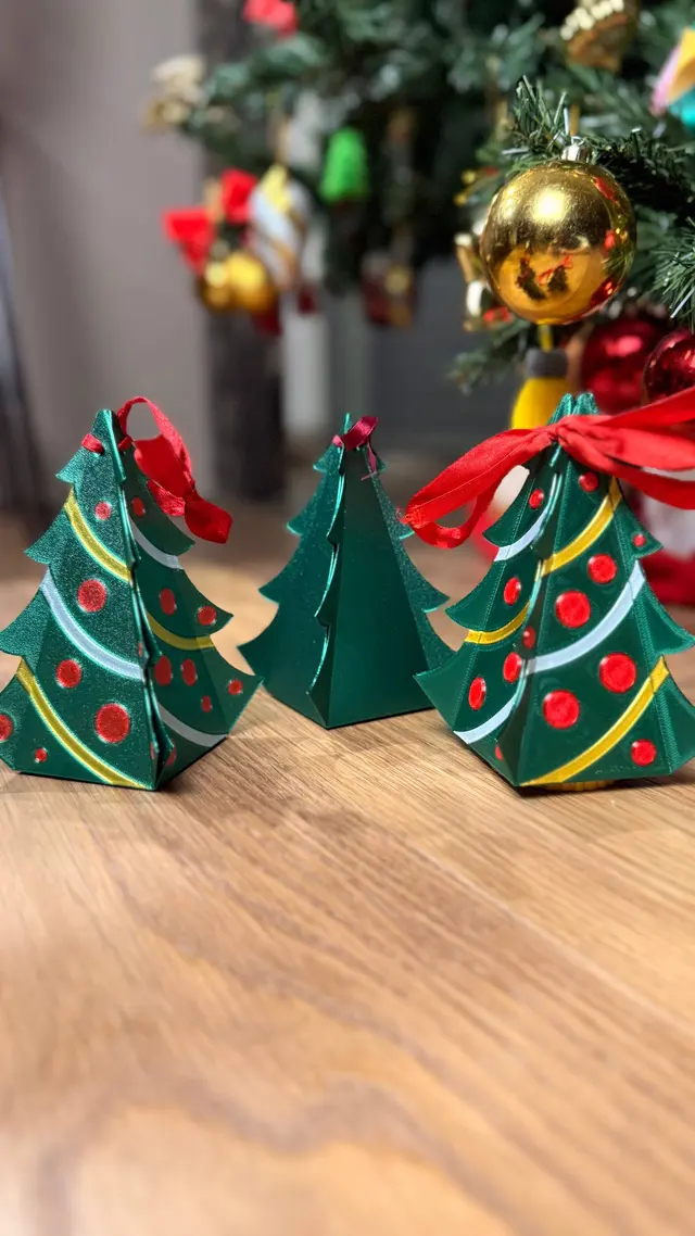 Three Fold Christmas Trees assembled on a wooden table