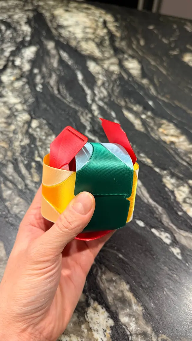 Two strips slotted together during assembly