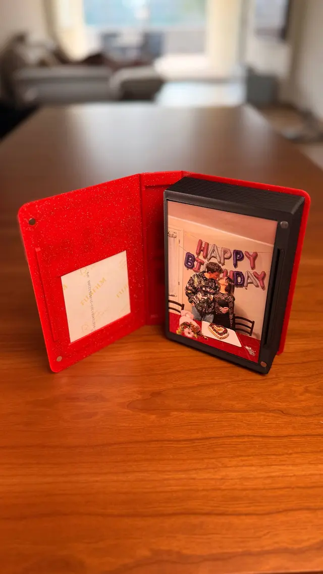 Love Book standing open with a photo on the first page
