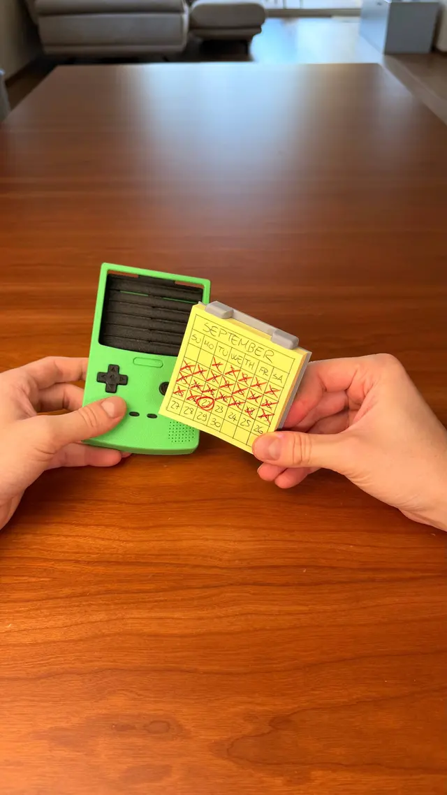 The cartridge with the sticky notes pulled out of the console