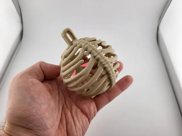 Rib cage Christmas bauble with a pink heart, view 4