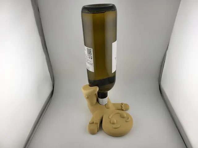 Gingerbread man wine bottle holder with a bottle of wine, view 4