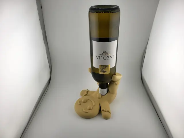 Gingerbread man wine bottle holder with a bottle of wine, view 6