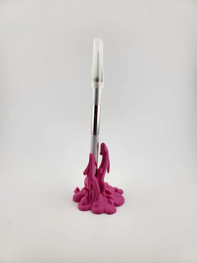 Pink Slime pen holder with an upright pen, another view