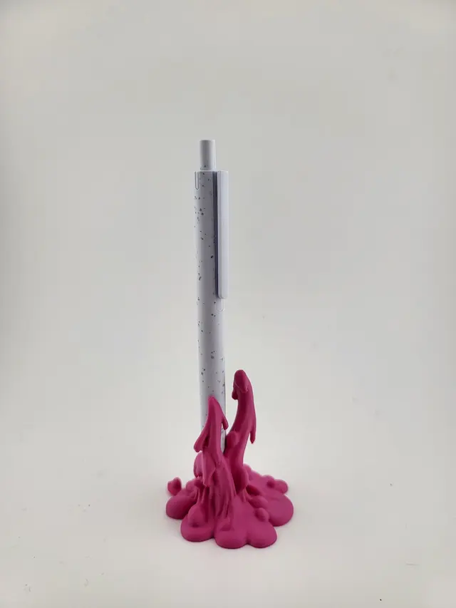 Pink Slime pen holder with an upright pen, another view