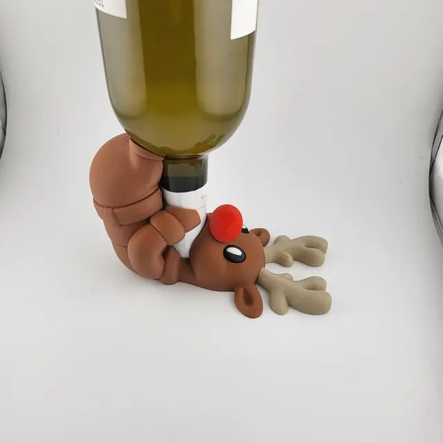 Red-nosed reindeer holding a bottle of wine, view 2