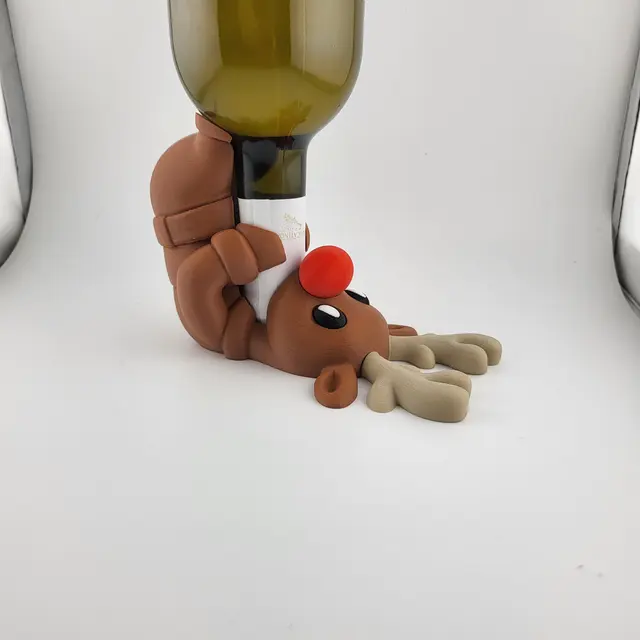 Red-nosed reindeer holding a bottle of wine, view 5