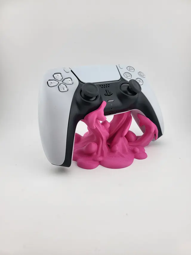 Pink dripping Slime stand with a white controller