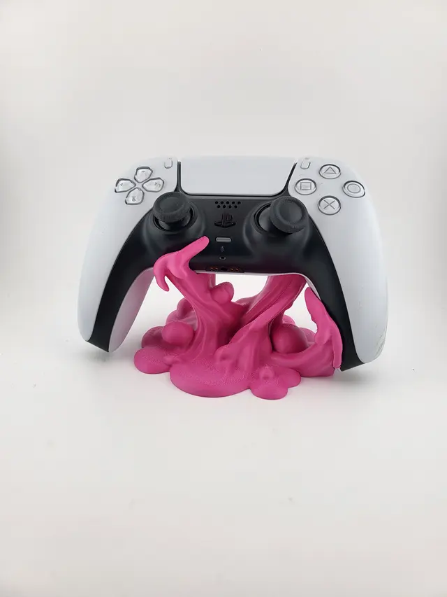 Pink dripping Slime stand with a white controller, another view