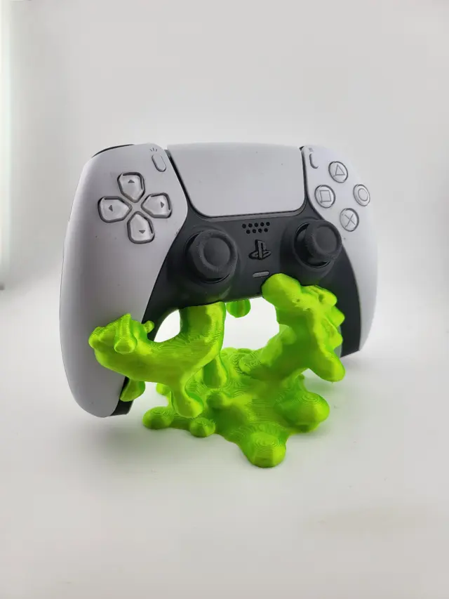 Lime green blob Slime stand with a white controller, another view