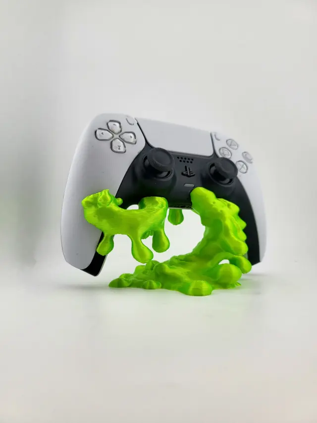 Lime green blob Slime stand with a white controller, another view