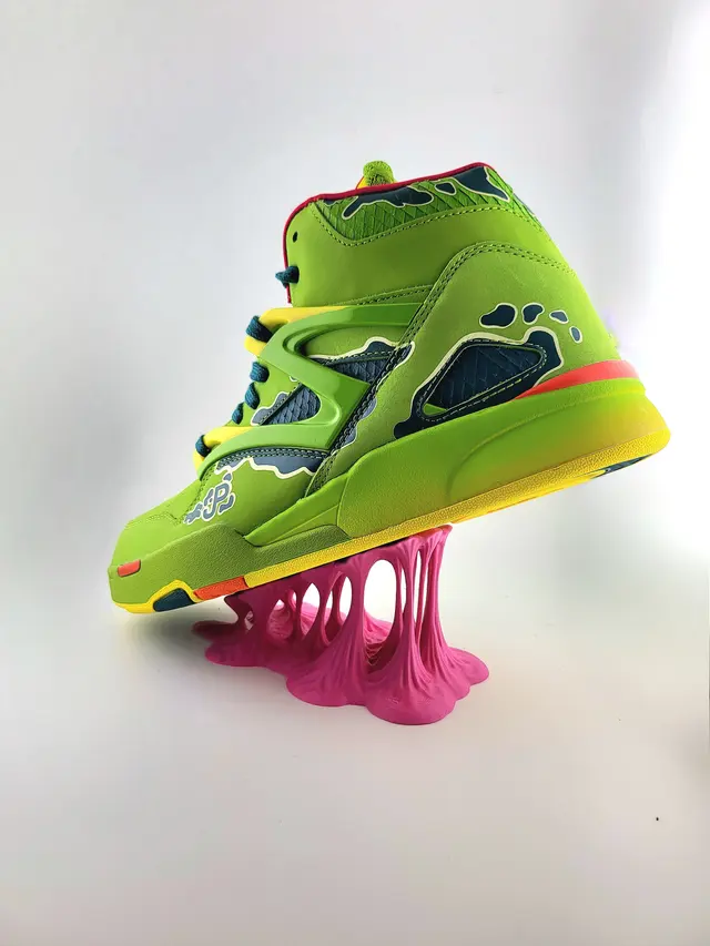 Pink Bubble Gum display stand with a green sneaker