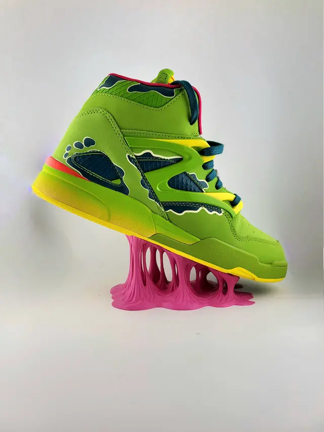 Pink Bubble Gum display stand with a green sneaker, another view