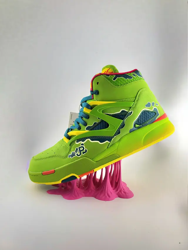 Pink Bubble Gum display stand with a green sneaker, another view